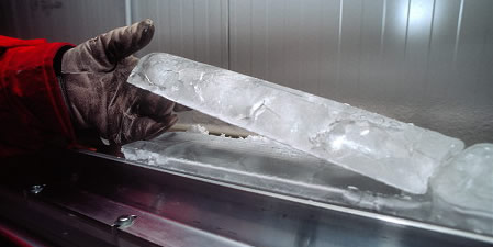 Researcher Holding an Ice core sample